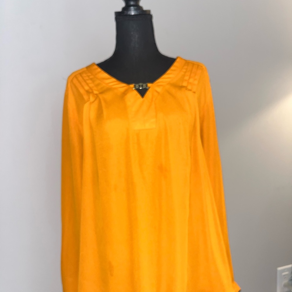 Women’s Apricot long sleeve Blouse.